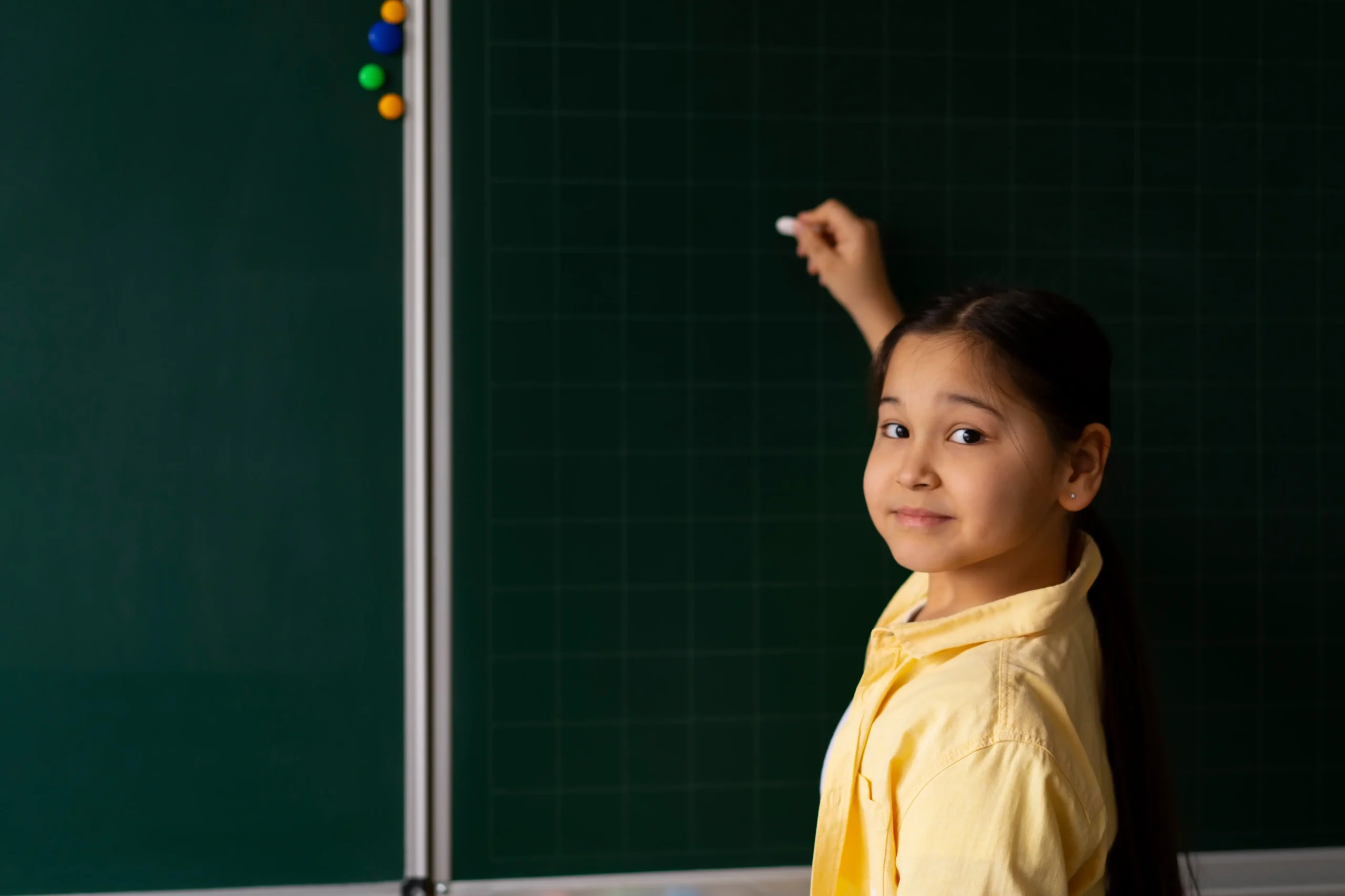 Image of children in a classroom receiving school supplies (1)